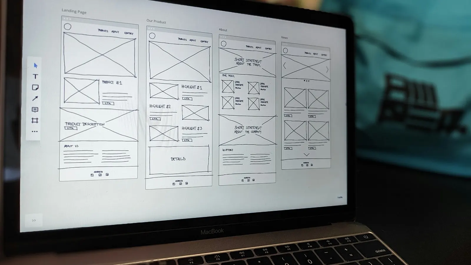 A website layout being planned on a laptop screen