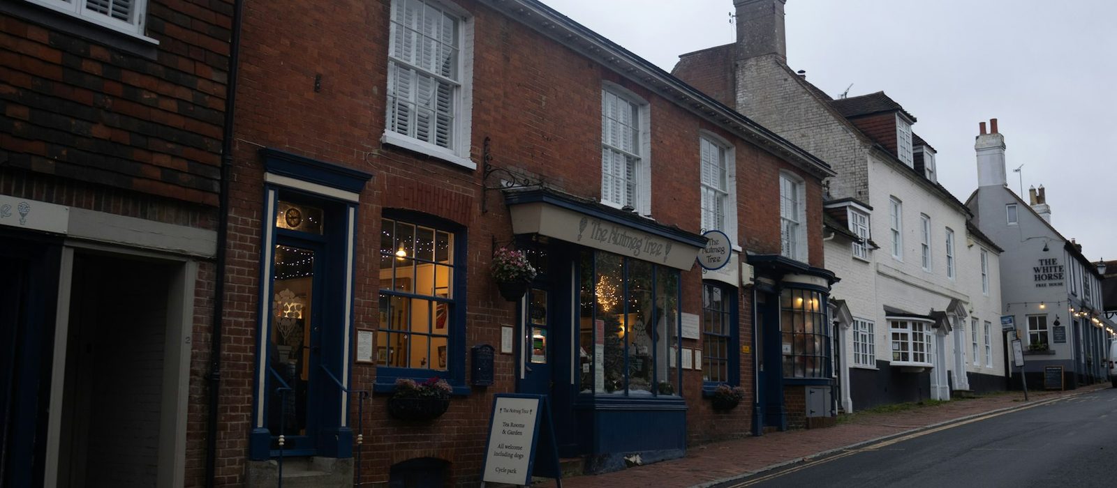 Brick shopfronts on a quiet street