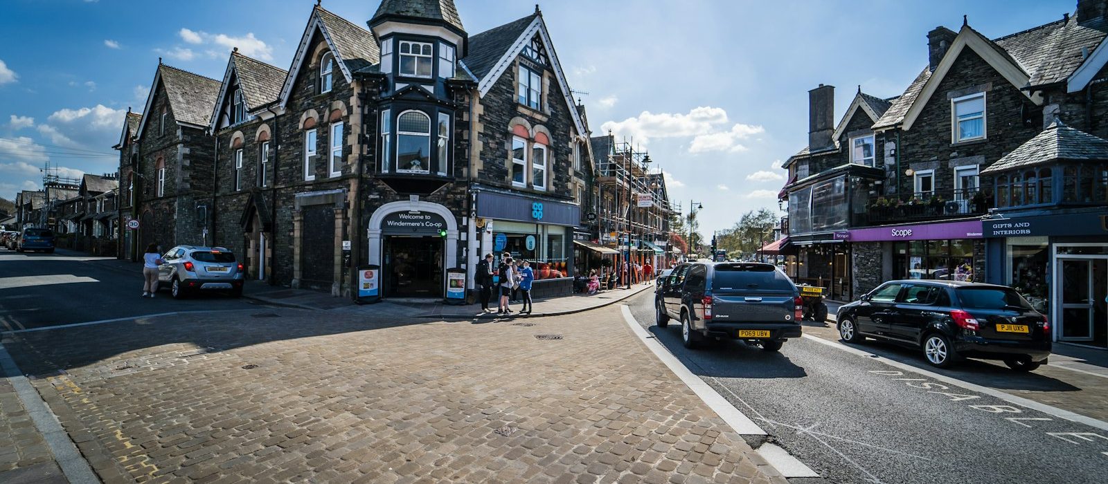 Shops and traffic on a town centre street