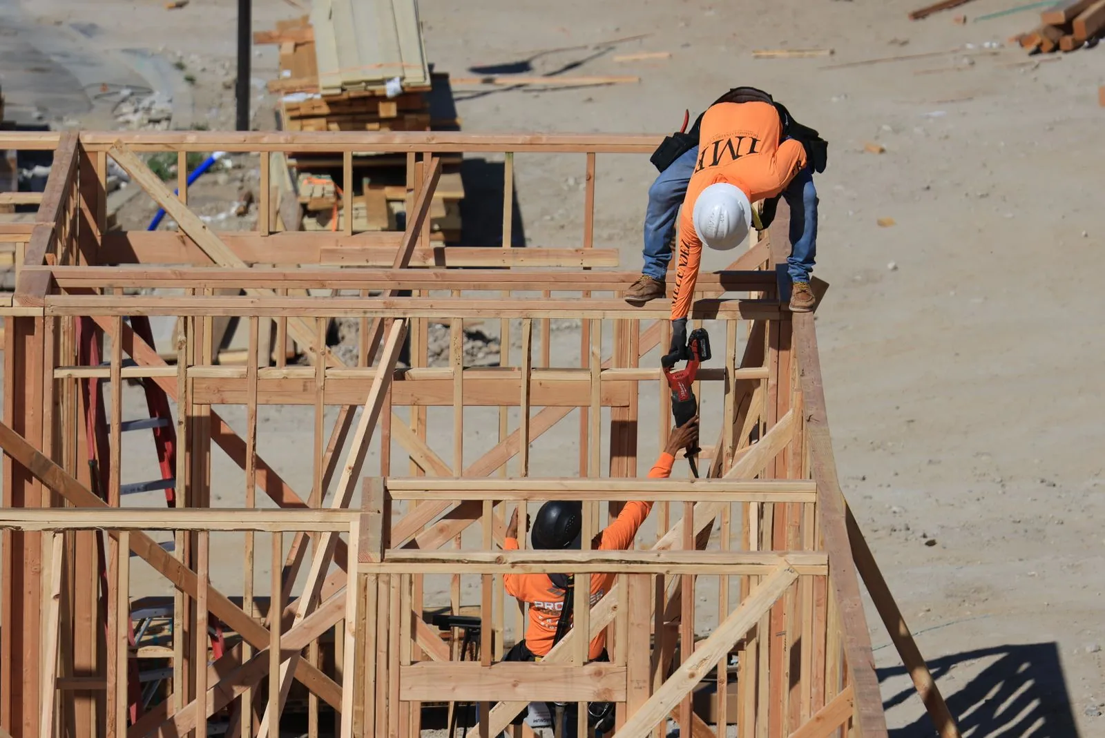 A timber frame going up on a building site
